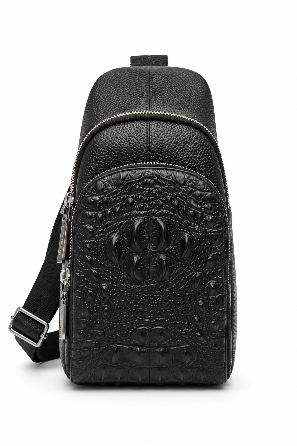 The Bergamo crocodile-embossed leather sling bag in black, worn across the chest