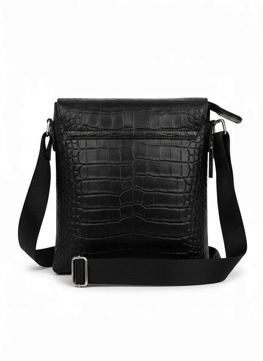 Barutti Bags & Accessories black leather crossbody bag with crocodile-embossed front panel and adjustable strap.