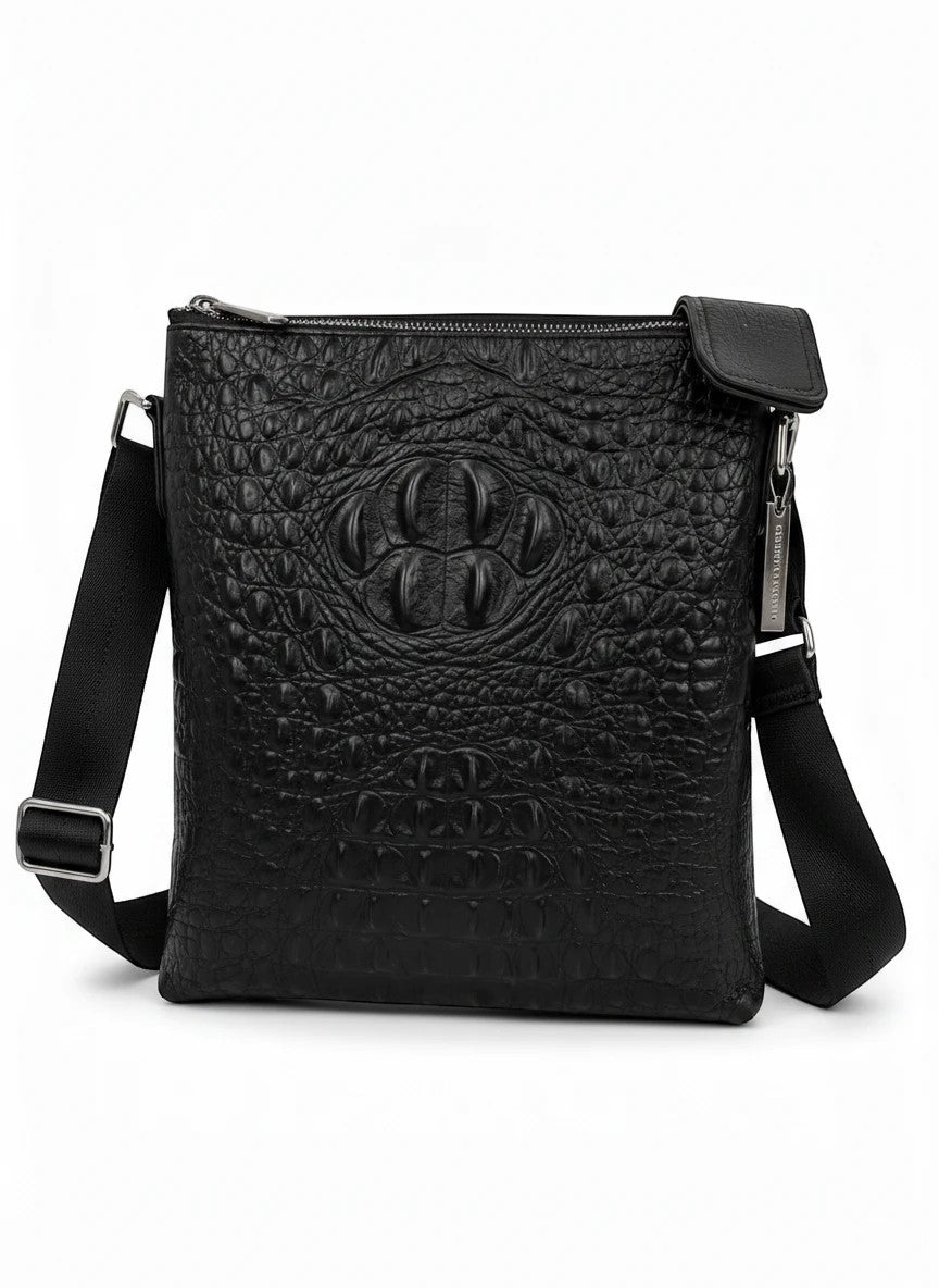 Barutti Bags & Accessories black leather crossbody bag with crocodile-embossed front panel and adjustable strap.
