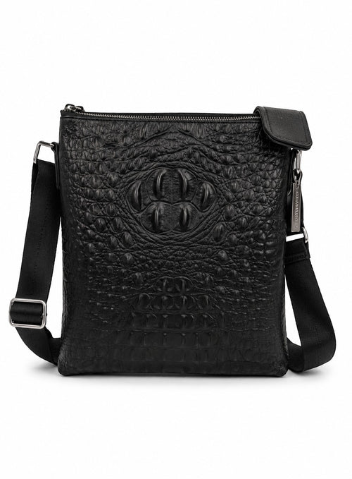 Barutti Bags & Accessories black leather crossbody bag with crocodile-embossed front panel and adjustable strap.