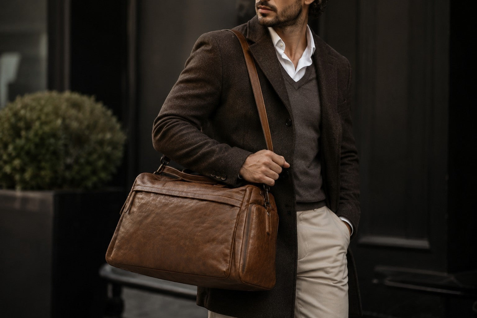 Barutti Bags & Accessories Toscana distressed full-grain leather weekender duffel bag with shoulder strap and carry handles.